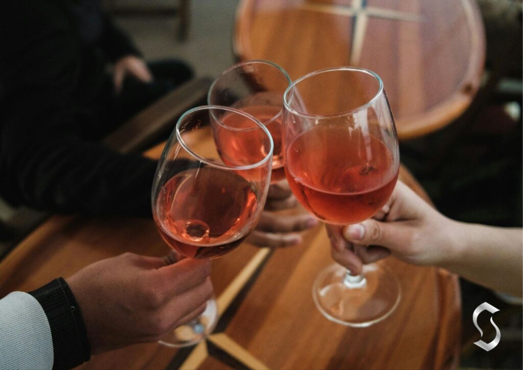 People enjoying alcoholic drinks during an evening out